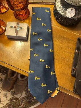 Taylor Navy Tie with Yellow Stock Market Bull & Bear Symbol